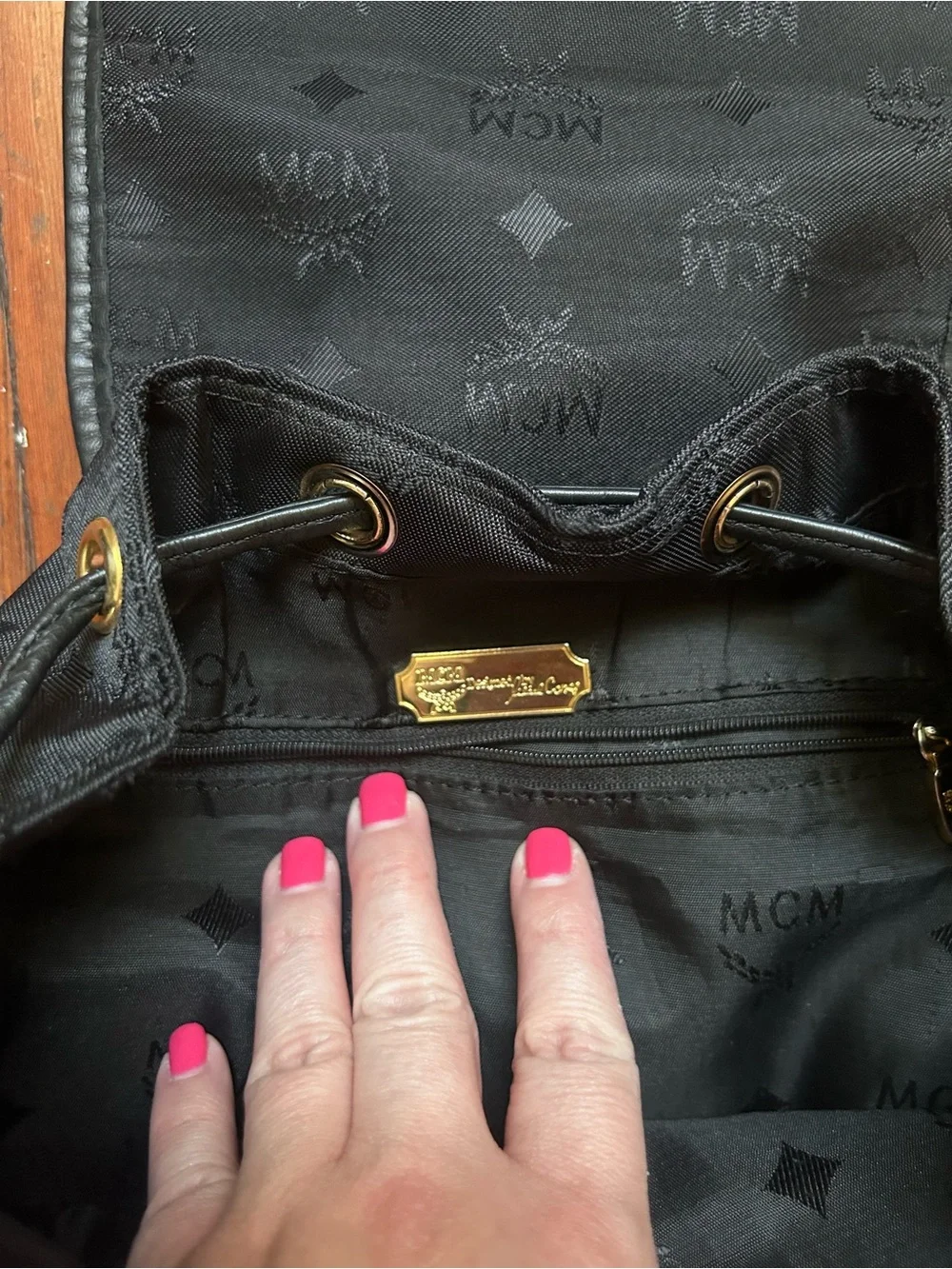 MCM Black Logo Backpack with Gold Plaque